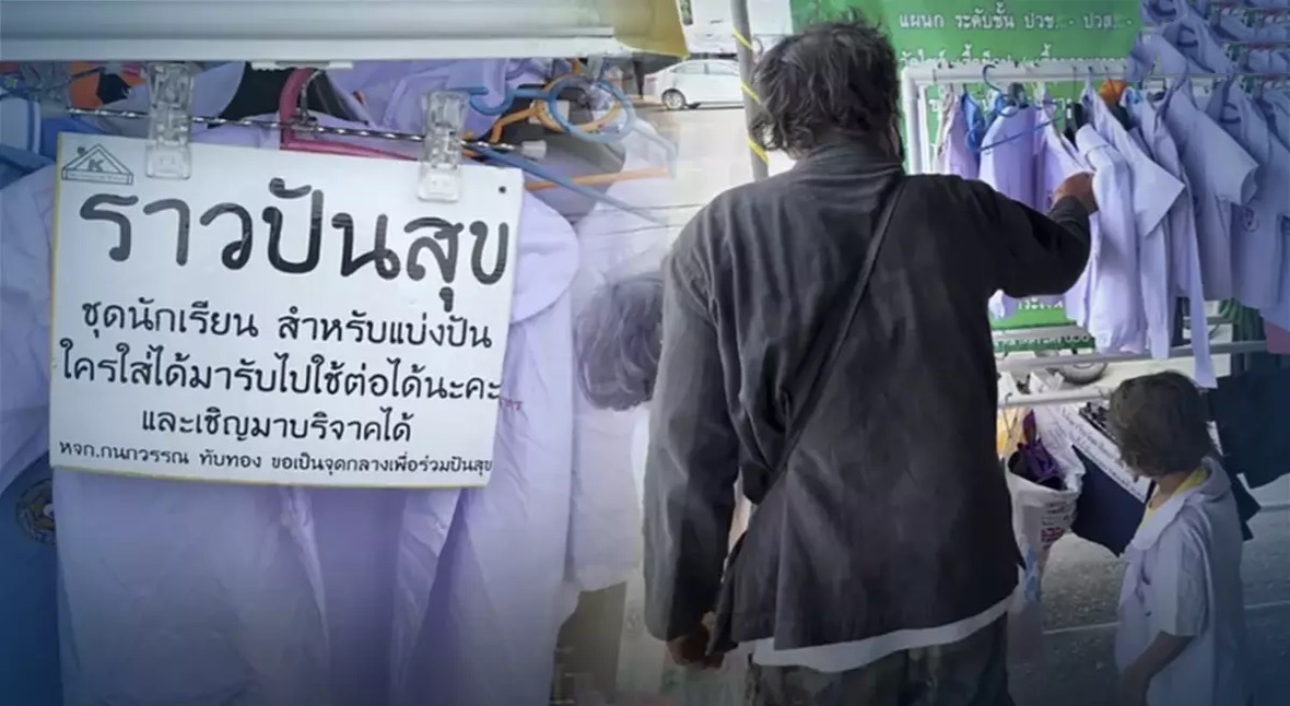 Thaise verkoper van schooluniformen zet een deelrek voor de armlastige mensen in Noord-Thailand op