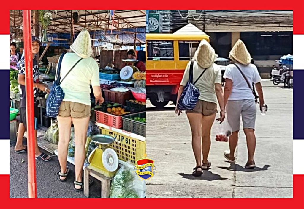 Nietsvermoedende toeristen zetten een Thaise rijststomer als hoed op het hoofd, Thaise bevolking lacht zich een kreuk😂