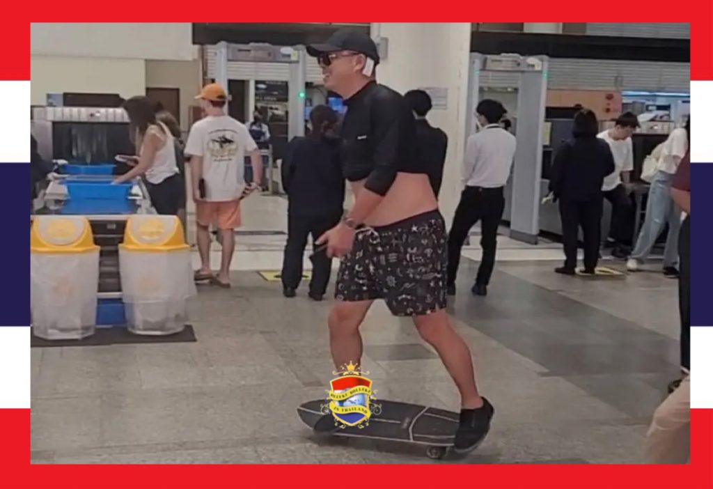 Driftige Chinees probeert Thaise politieagent op Don Mueang Airport (Thailand) uit te dagen, maar de agent verblikt of verbloost niet
