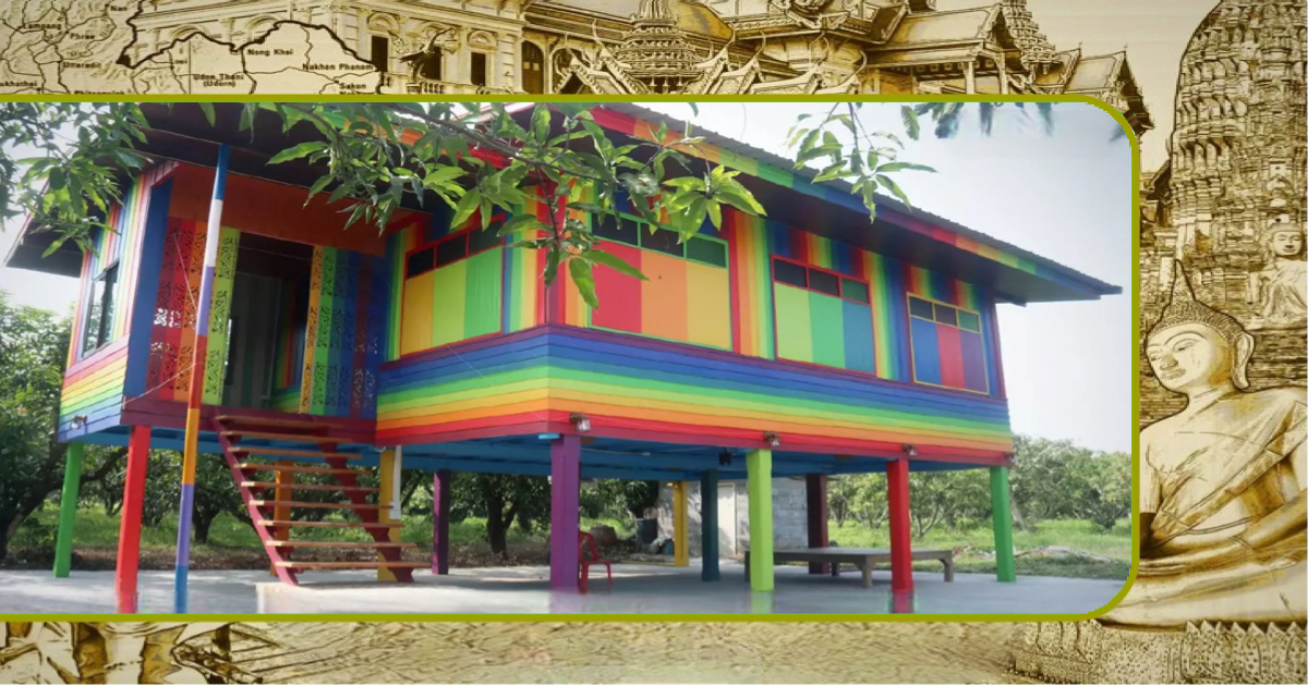 Eigenaren van een huis in Noord-Thailand schilderen hun huis in de regenboog kleuren 
