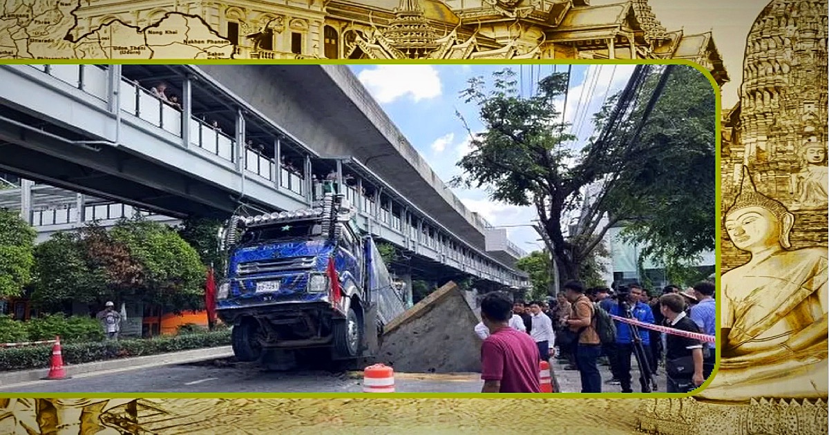 Vrachtwagen zakt door een betonplaat op de Sukhumvit Road in Bangkok