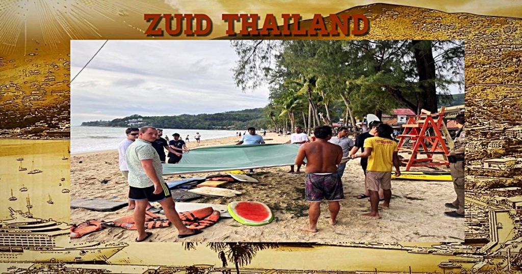 Valwind op Phuket zorgt ervoor dat een toerist lange tijd in de bomen van Kamala beach bengelde 