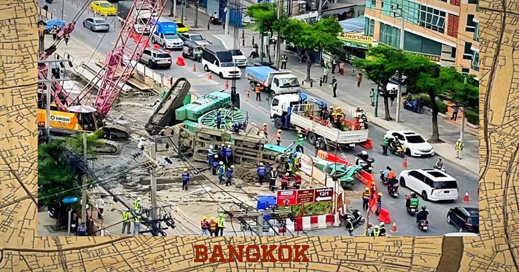 Motorrijder in het district Thonburi, Bangkok gewond, nadat een bouwkraan op zijn kant viel