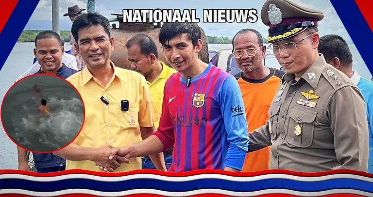 Visser geëerd als een nationale held van Thailand, voor het redden van twee jonge jongens van de verdrinkingsdood