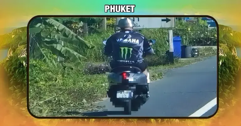Hongerige buitenlander toert door Zuid-Thailand met een soeppan op zijn hoofd als helm