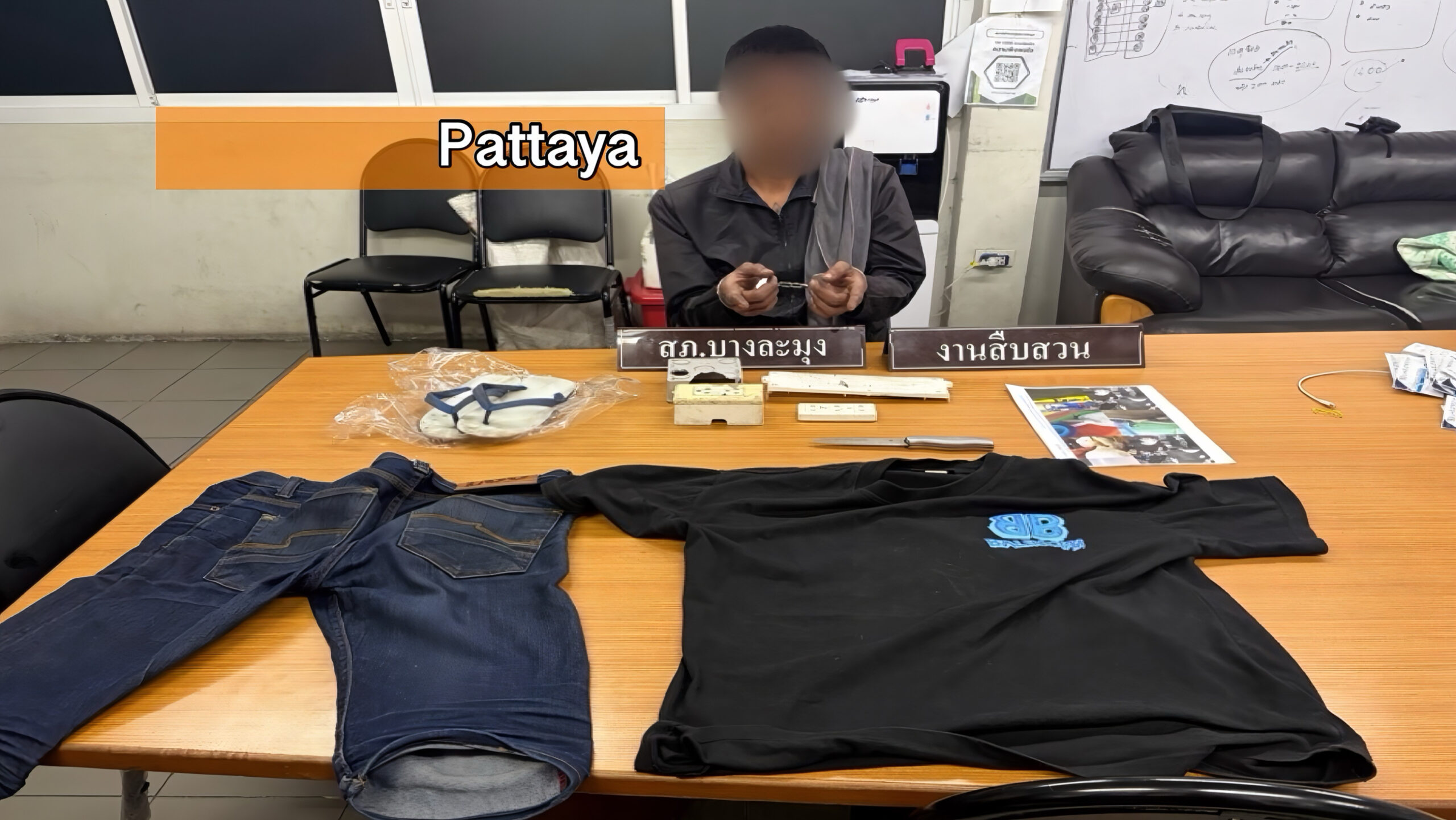 Winkeldief in Pattaya wordt op camerabeelden betrapt, bij aanhouding trachtte hij een politieagent neer te steken.